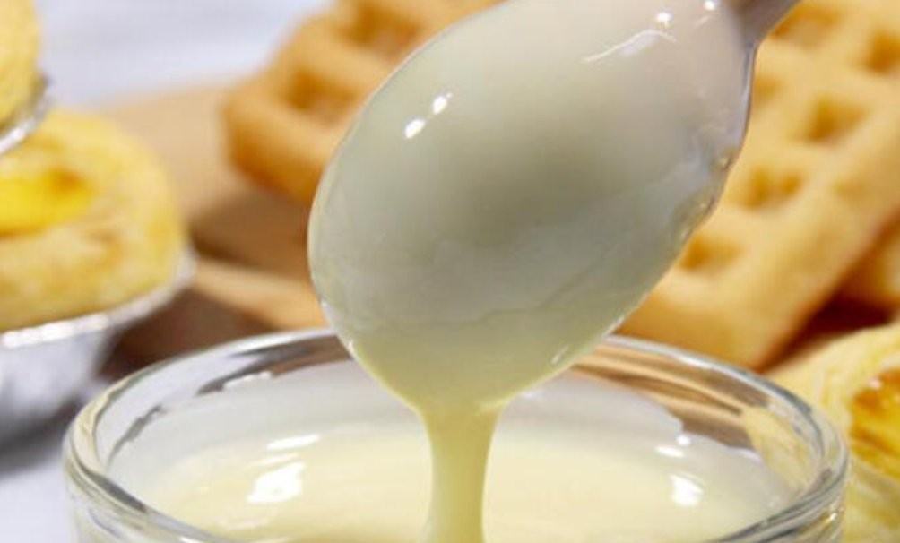 ZDA sweetened condensed milk in a large tinplate can with an easy-open pull-ring lid